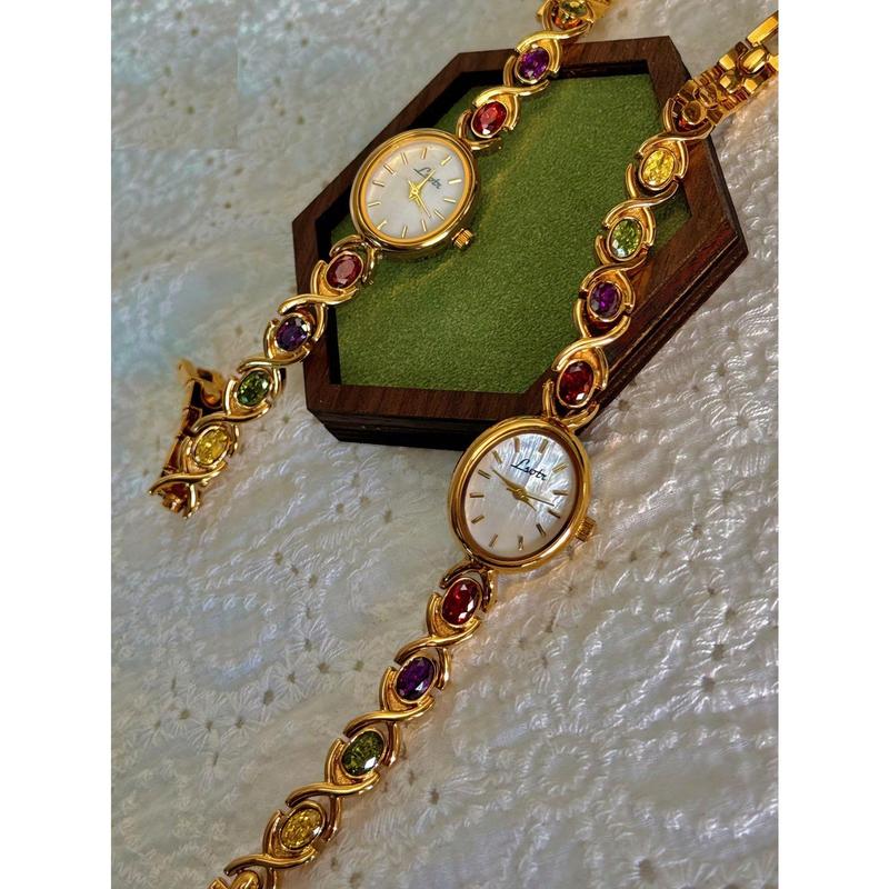 1pc New High-End Luxury Women's Watch Embedded With Colorful Tourmalines, Diamonds And An Oval Shaped Mother Of Pearl Dial. It Can Be Worn On A Daily Basis, Or For Occasions Such As Parties, Holidays And Outings To Decorate The Wrist