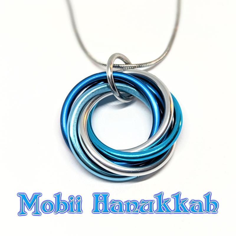 Möbii Happy Holidays Jewelry - Stylish Fidget Keychains, Necklaces, or Earrings - by Steel Lynx