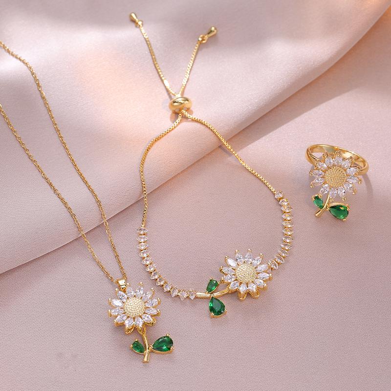 Jewelry set necklace + bracelet + ring female necklace rotating sunflower bracelet + ring Fashion suit clavicle chain