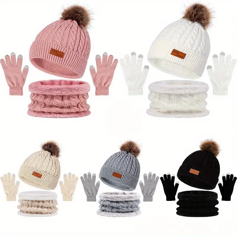 Winter Hats for women Festive winter knitted hat kit featuring pom - poms. This 3 - in - 1 warm set encompasses a thick hat, a cozy scarf, and touchscreen gloves. It's perfect for ladies during cold - day outings.